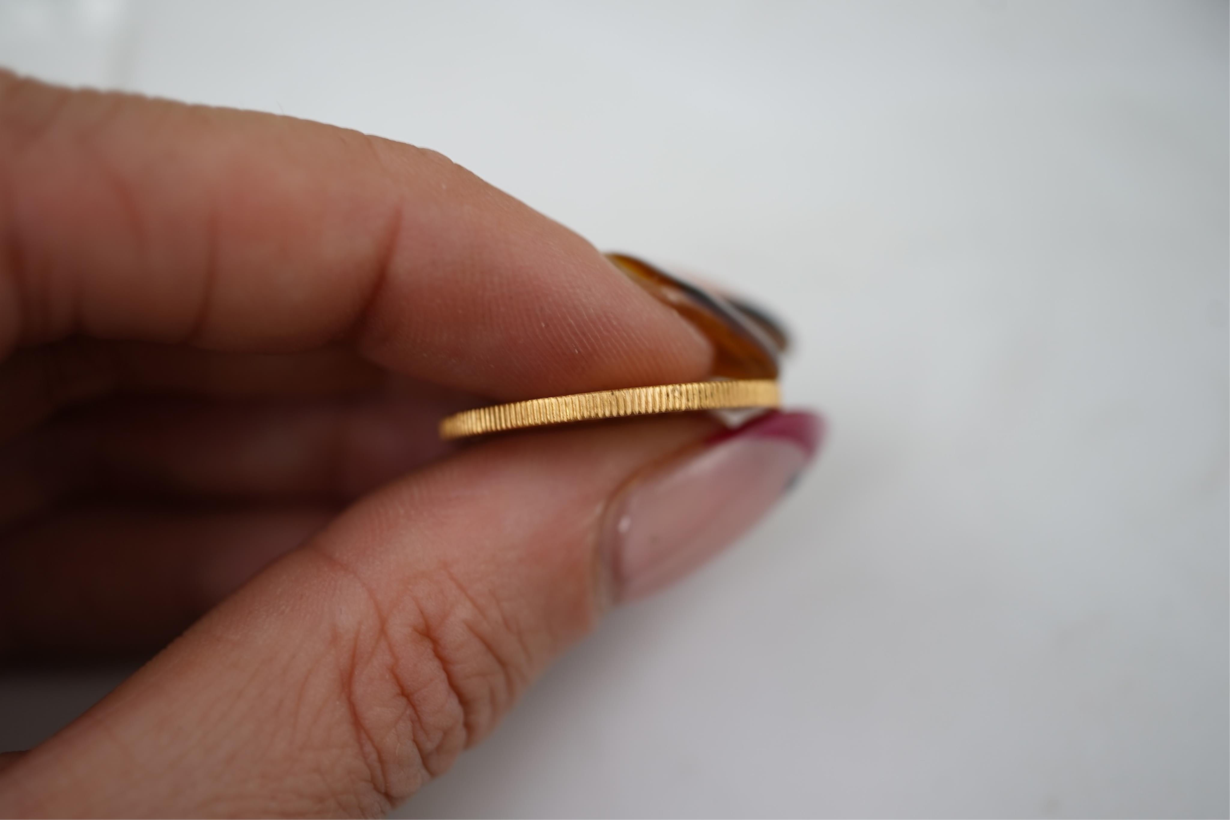 An Elizabeth II sovereign coin